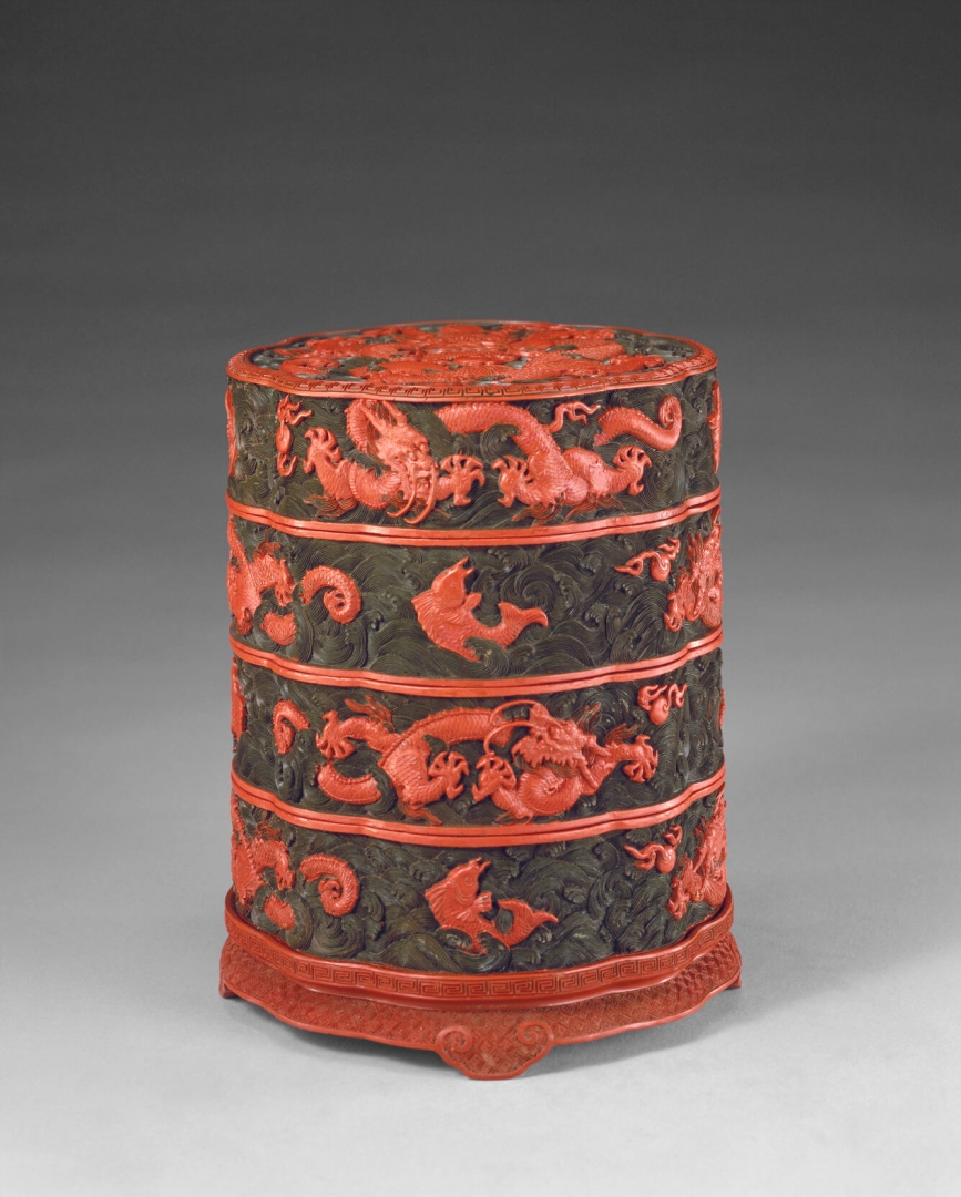 Carved Polychrome-lacquer <br />
Three-tiered Mallow-form <br />
Box with Fish Transforming <br />
into Dragons Design